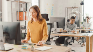 woman working with AI in a modern office